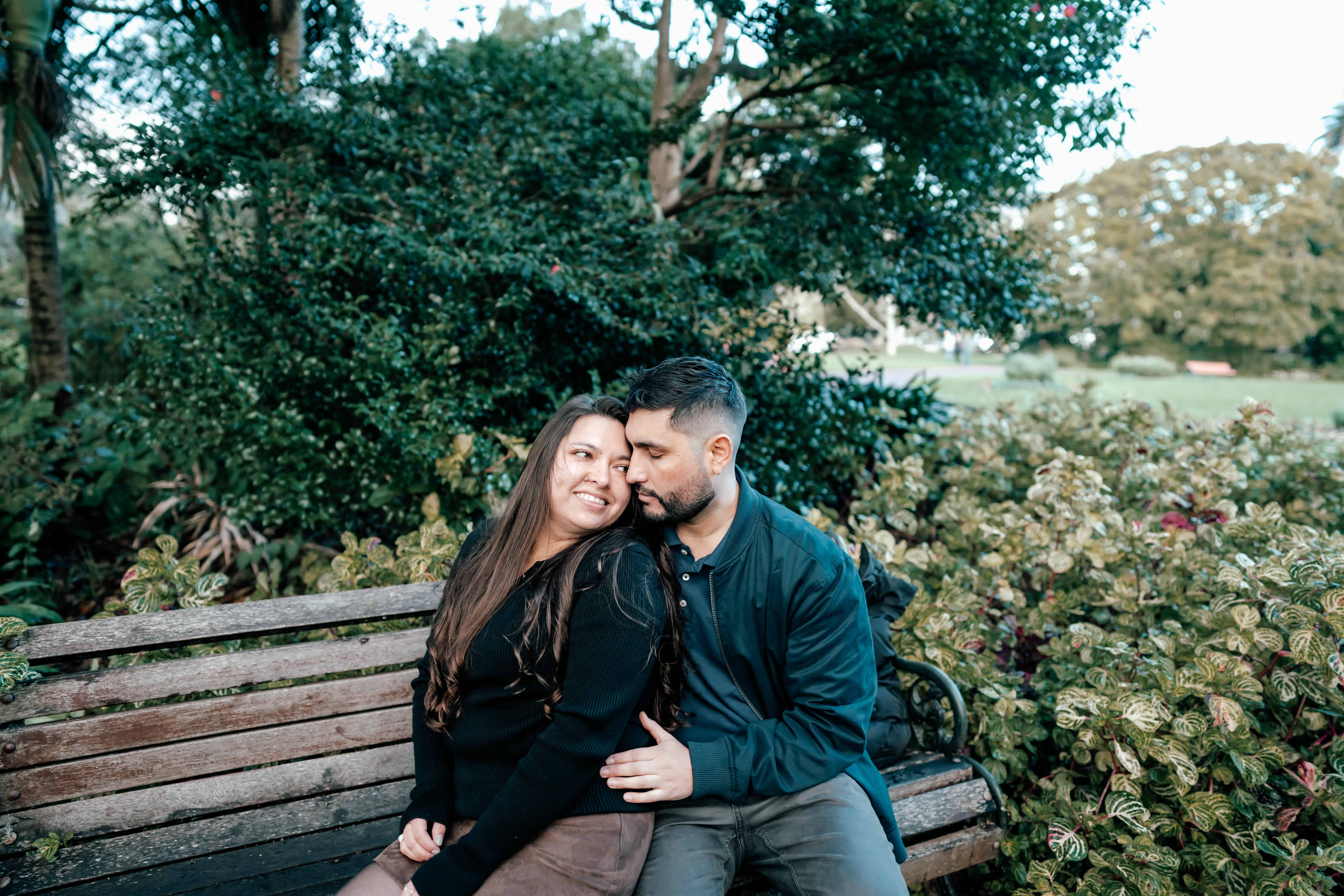 Surprise proposal setup with candles and flowers at Auckland Domain