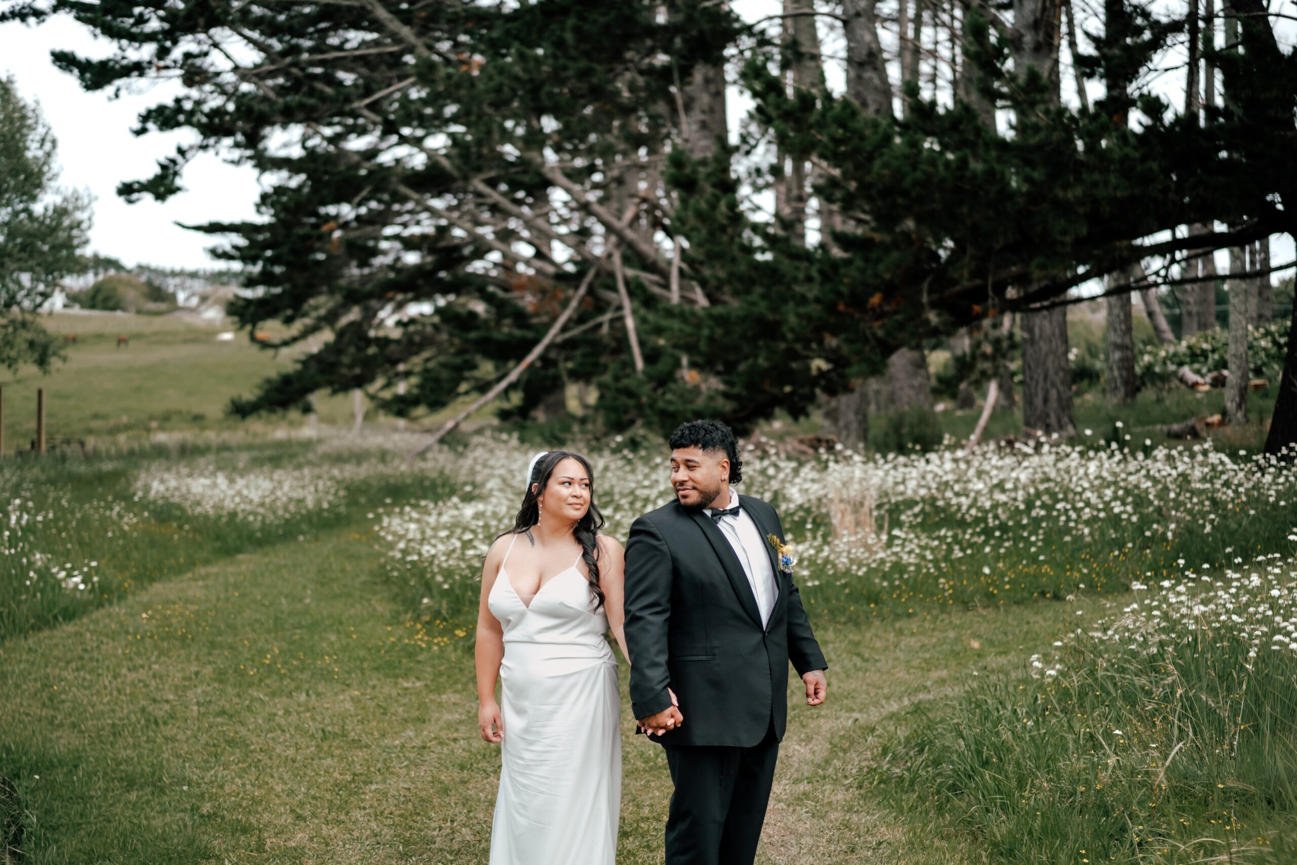 Christian and Jesse celebrating their wedding day at The Barn Waimauku in Auckland