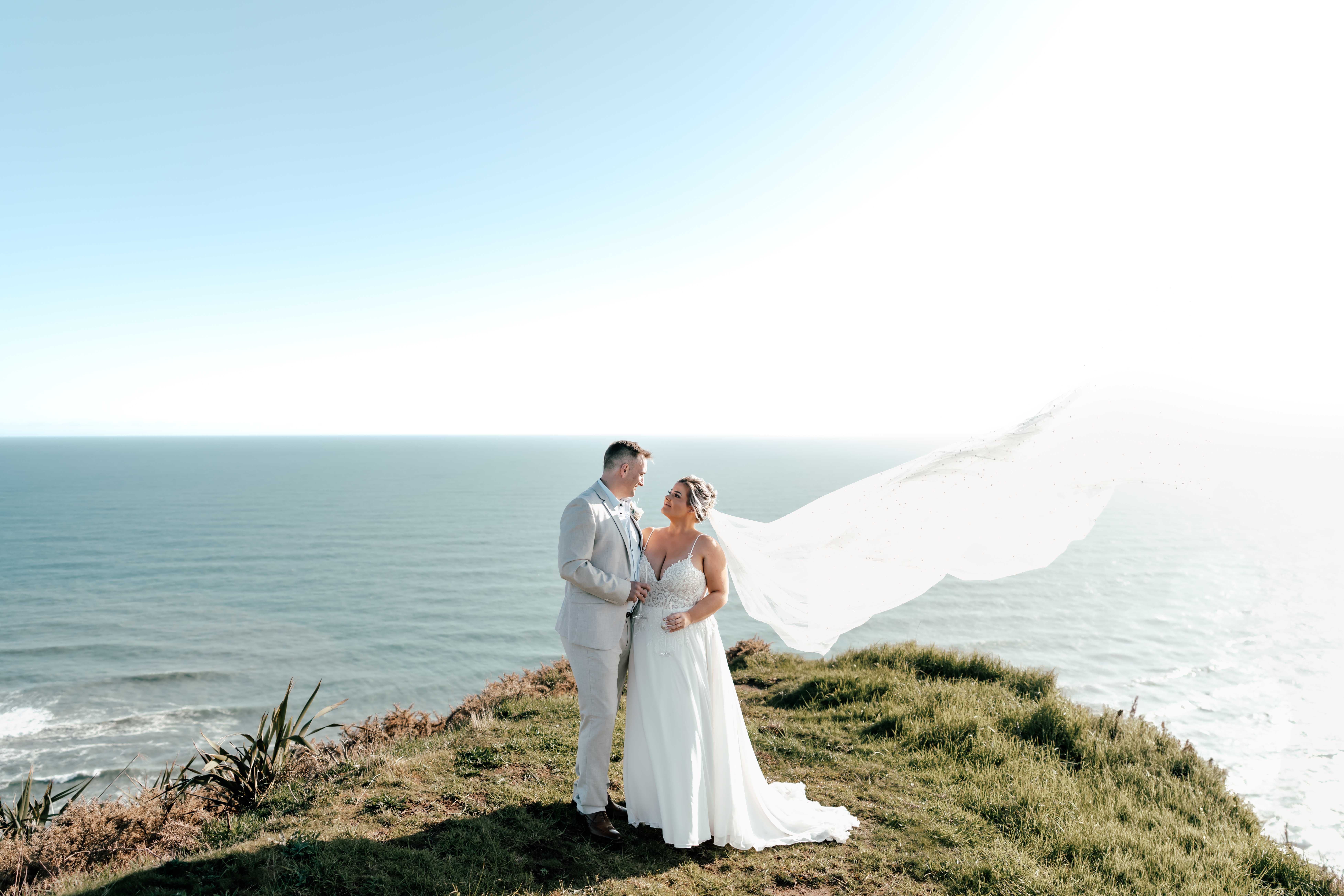Auckland Bethells Beach helicopter elopement captured by Zanthe Vorsatz Photography